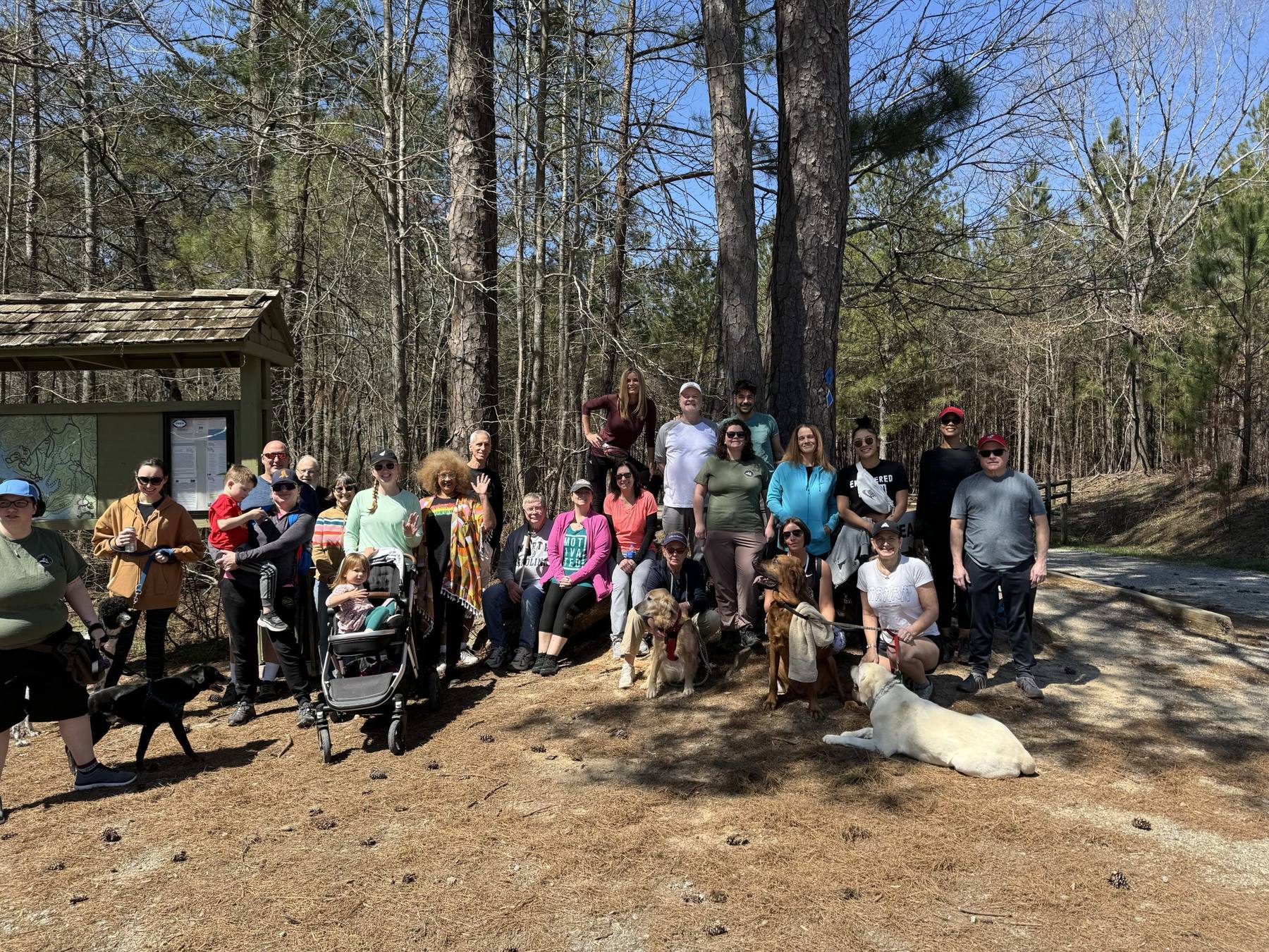 A large group of Ridgeview alumni, family, and friends gathered in the woods at the annual Recovery Walk